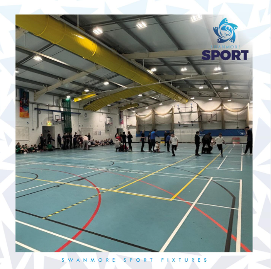 Image shows the Swanmore College sports hall being used for the year 5 and year 6 sports hall athletic event